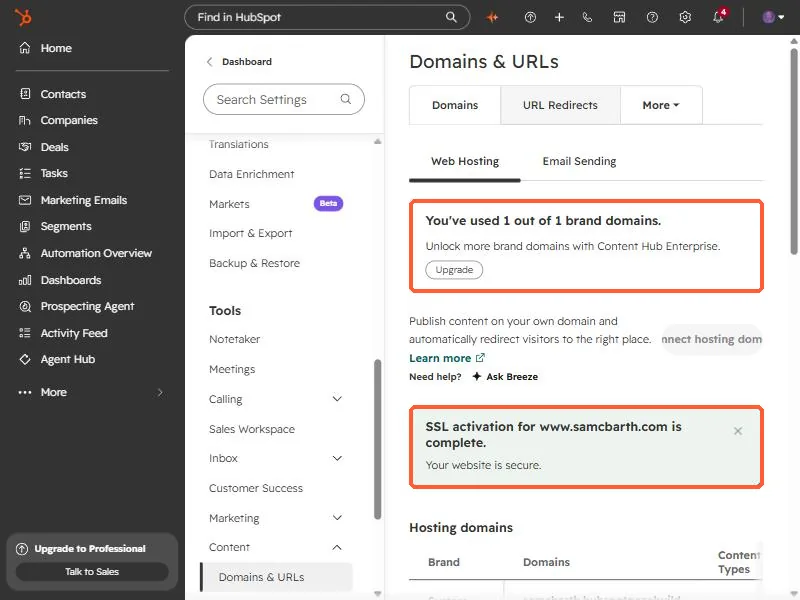 Domains and URLs page with the brand domain limit notice and the SSL activation message highlighted