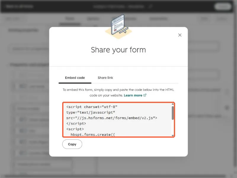 Share your form dialog on the Embed code tab with the code block highlighted